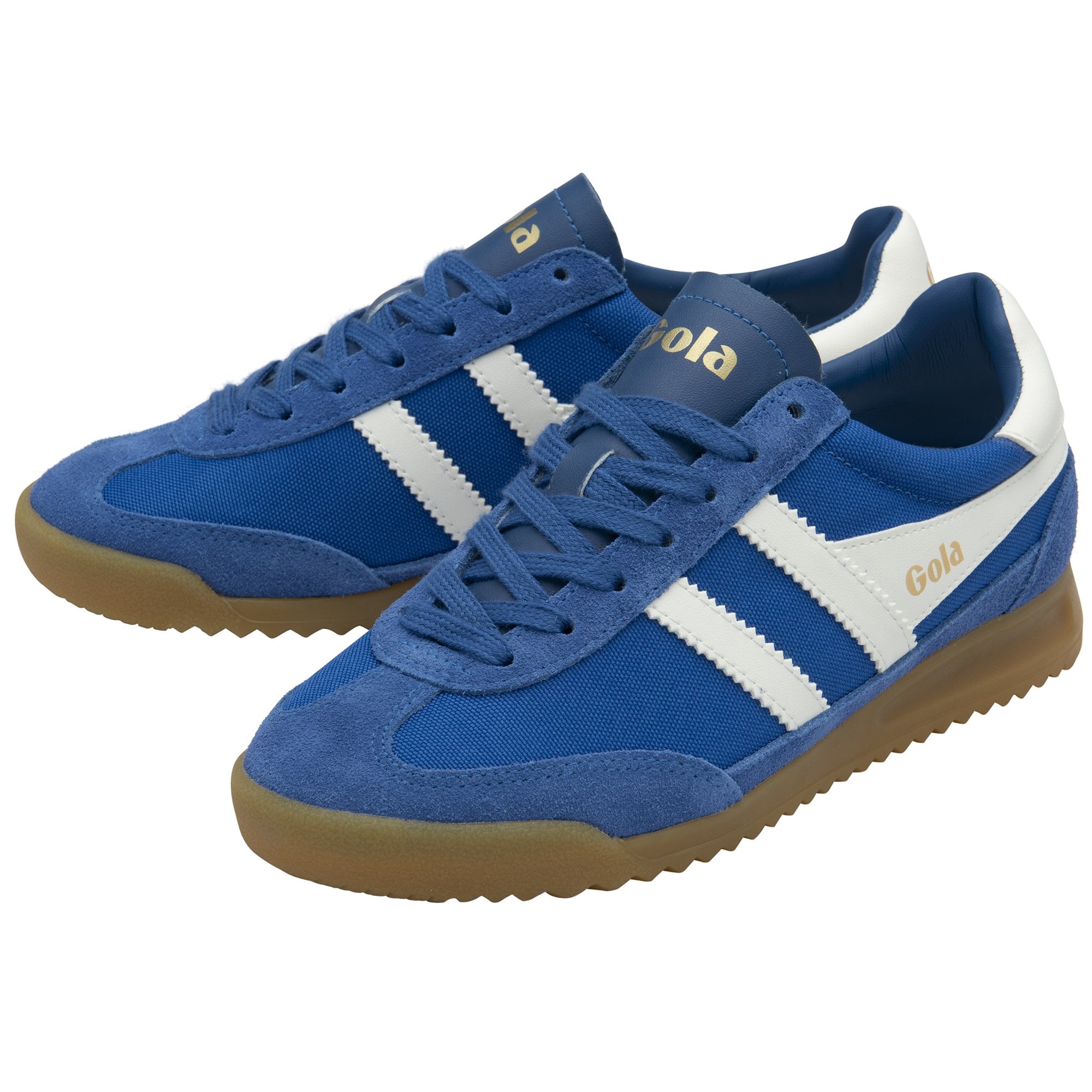 Pair of blue and white Gola trainers with brown soles, angled view.