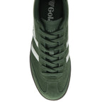 Top down view of a green Gola sneaker with white stripes and green laces.