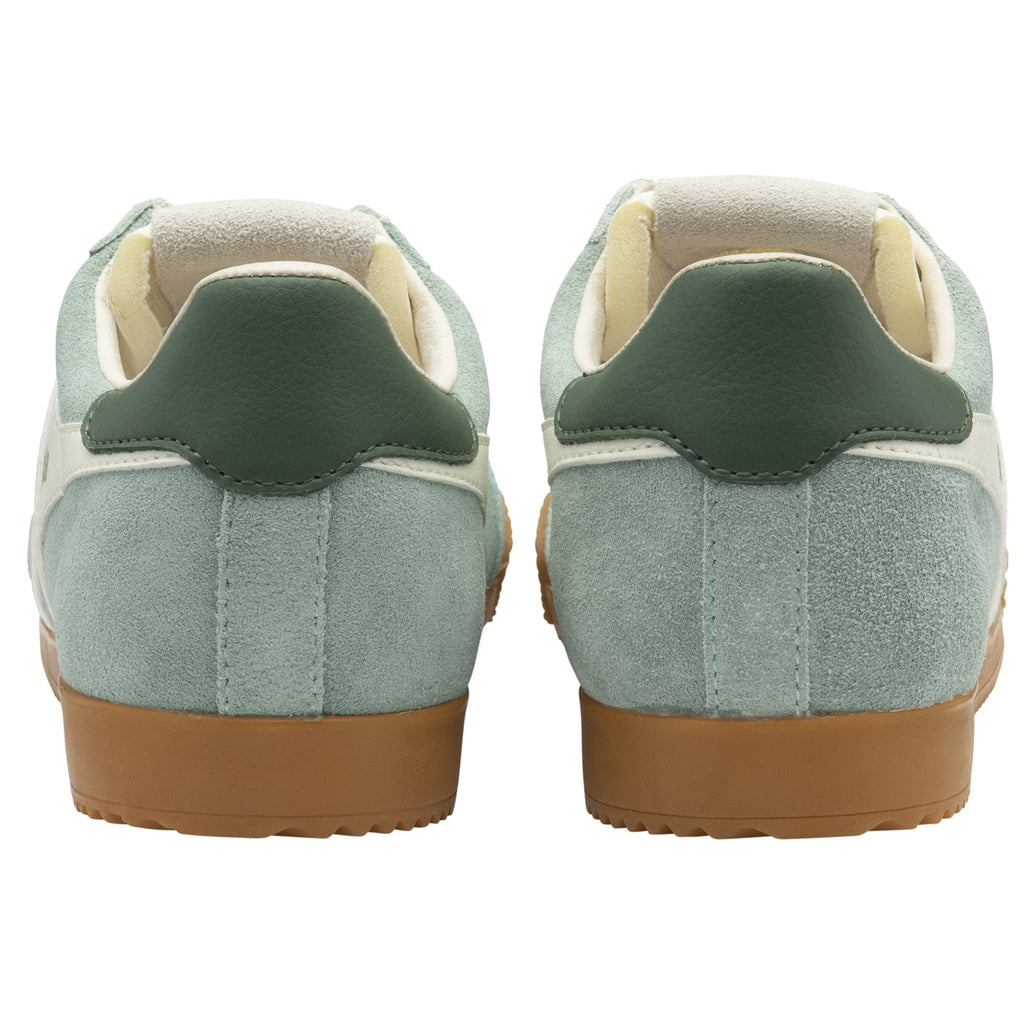 The back view of a pair of light blue suede Gola trainers with dark green accents.