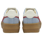 The back of two sky blue Gola Elan sneakers with red stripes and gum soles.