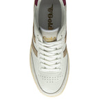 Top-down view of a white and beige sneaker with burgundy accents and white laces.