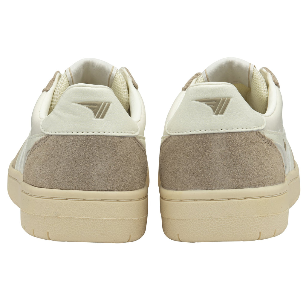 The heels of a pair of Gola low-top sneakers in off-white and beige.