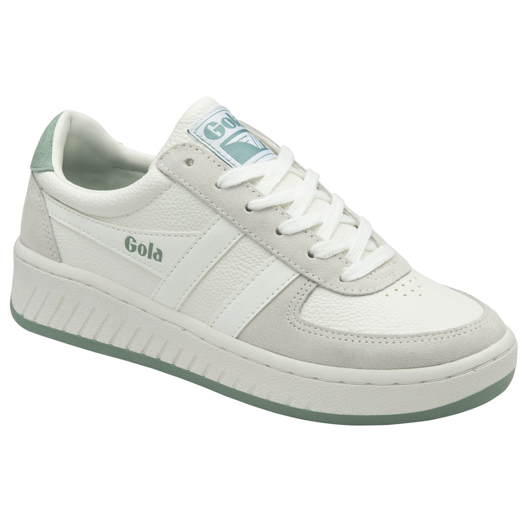 A white Gola sneaker with light green accents shown from a side angle.