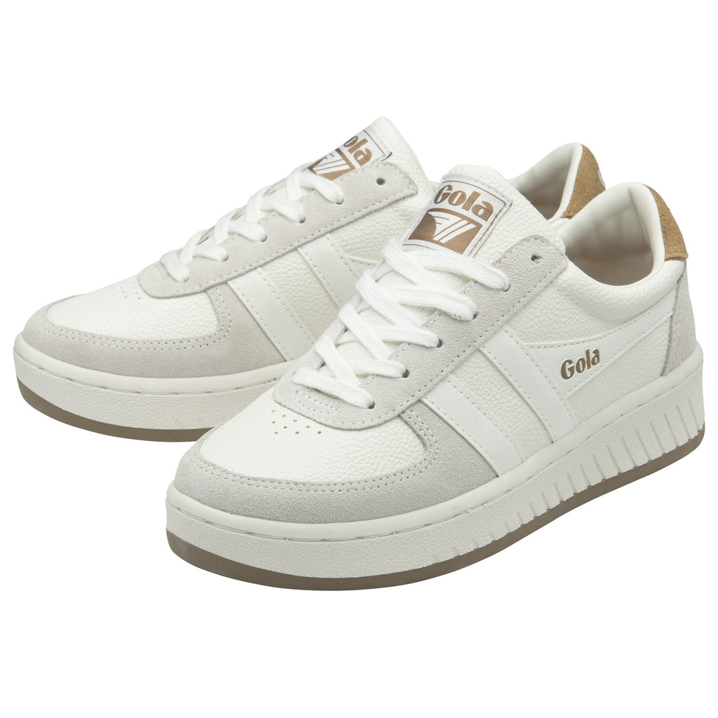 A pair of white Gola sneakers with light brown accents on the tongue and heel, facing right.