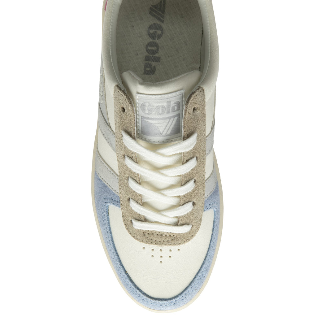 An overhead view of a white Gola sneaker with blue and beige details.