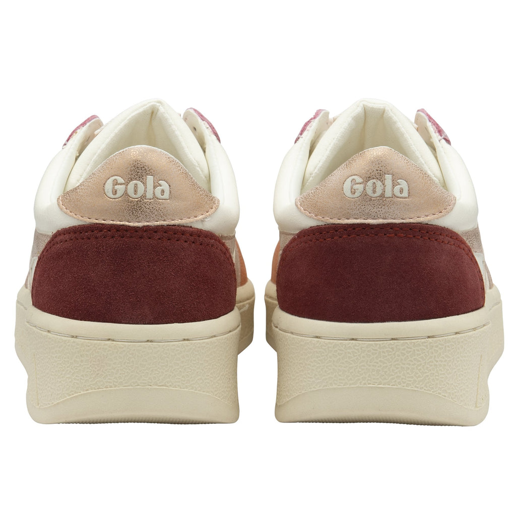 A back view of a pair of women's Gola sneakers in white with maroon accents.