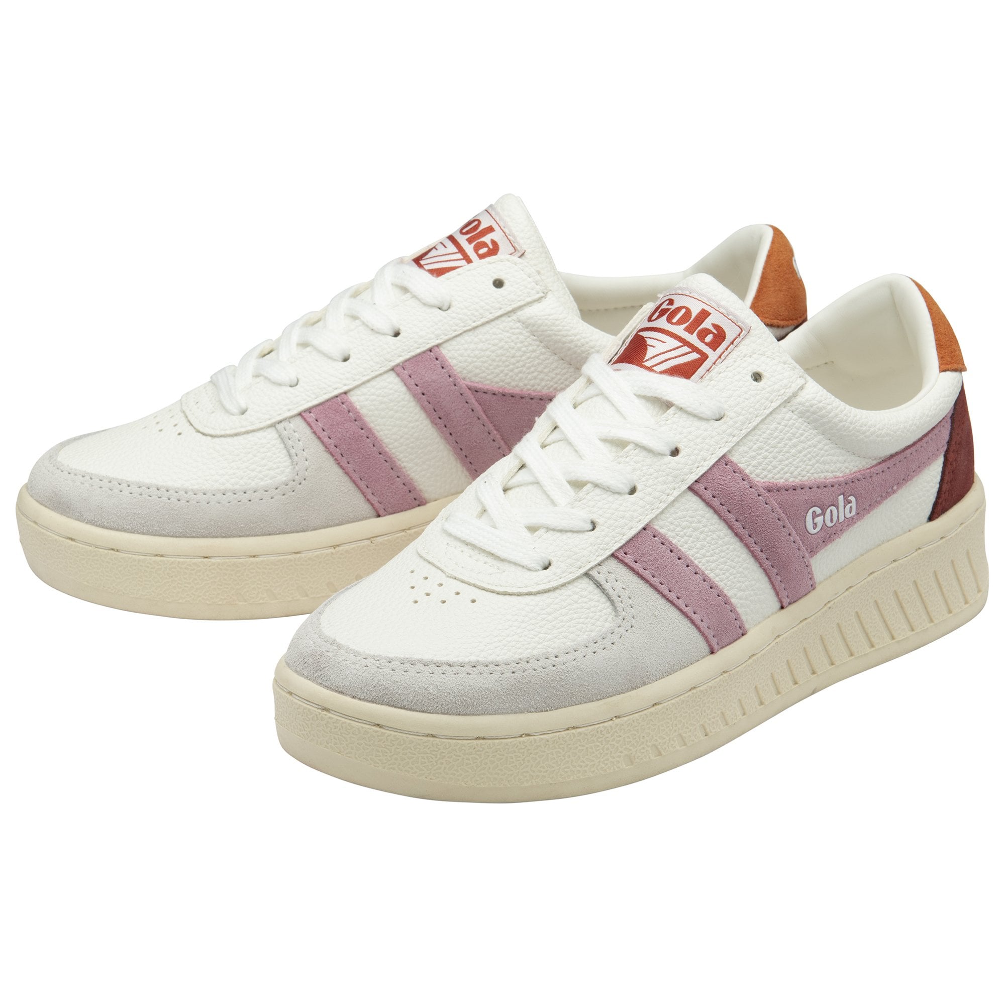 Two white Gola sneakers, with pink stripes and brown heels, in a three-quarter view.