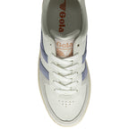 Top-down view of a white Gola sneaker with blue stripes and white laces.