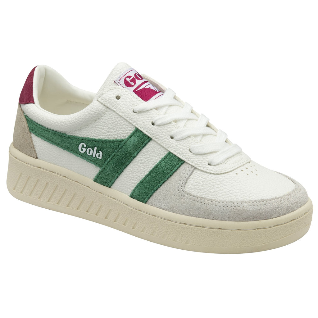 A white Gola sneaker with green stripes against a white background.