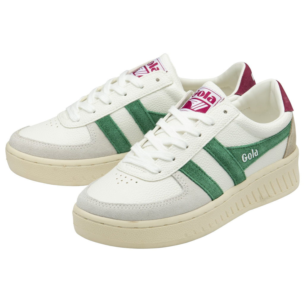 A pair of white Gola sneakers with green stripes and maroon accents.
