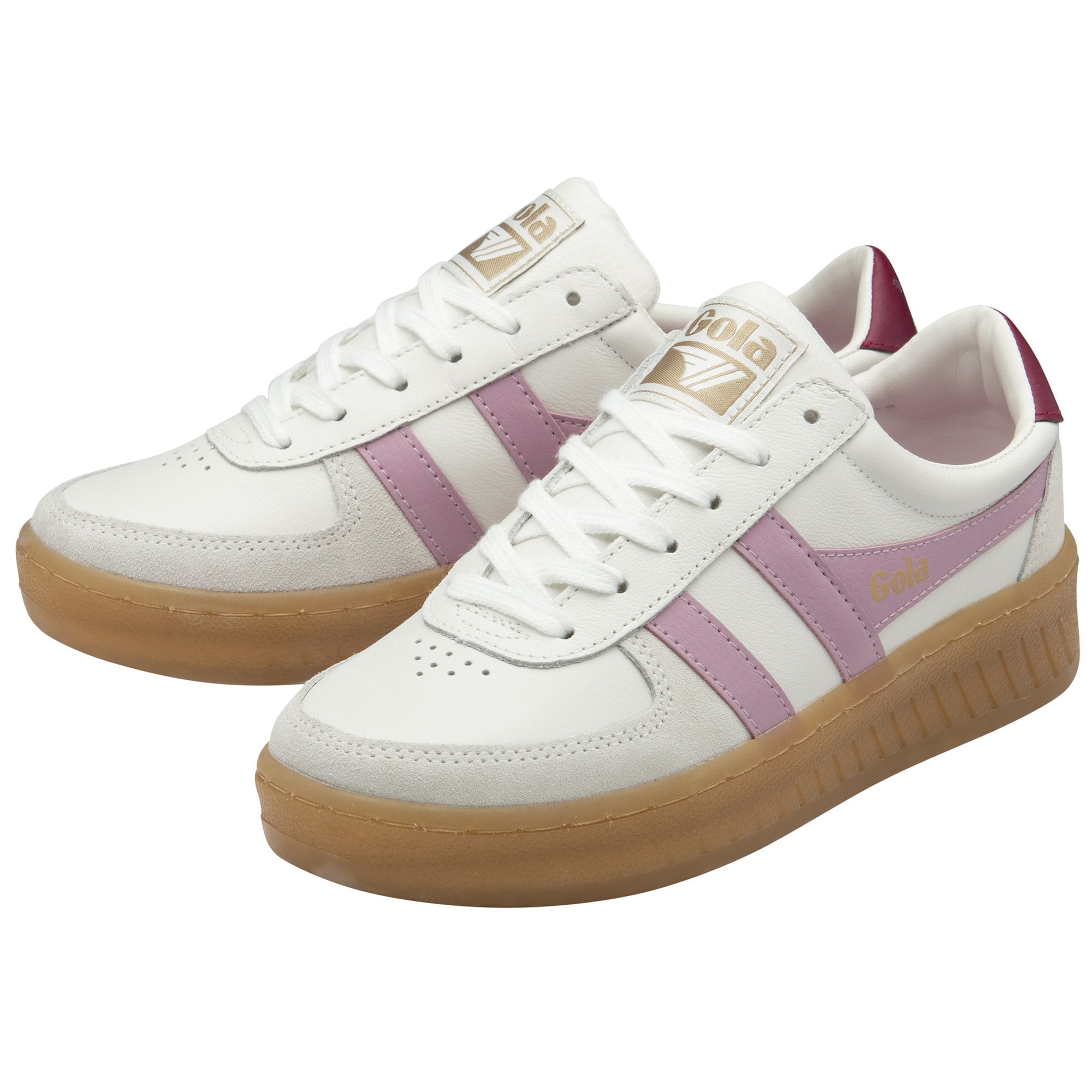 A pair of white Gola sneakers with purple stripes and gum soles, angled for display.
