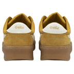 The back view of a pair of mustard yellow Gola sneakers with white heel accents and brown soles.