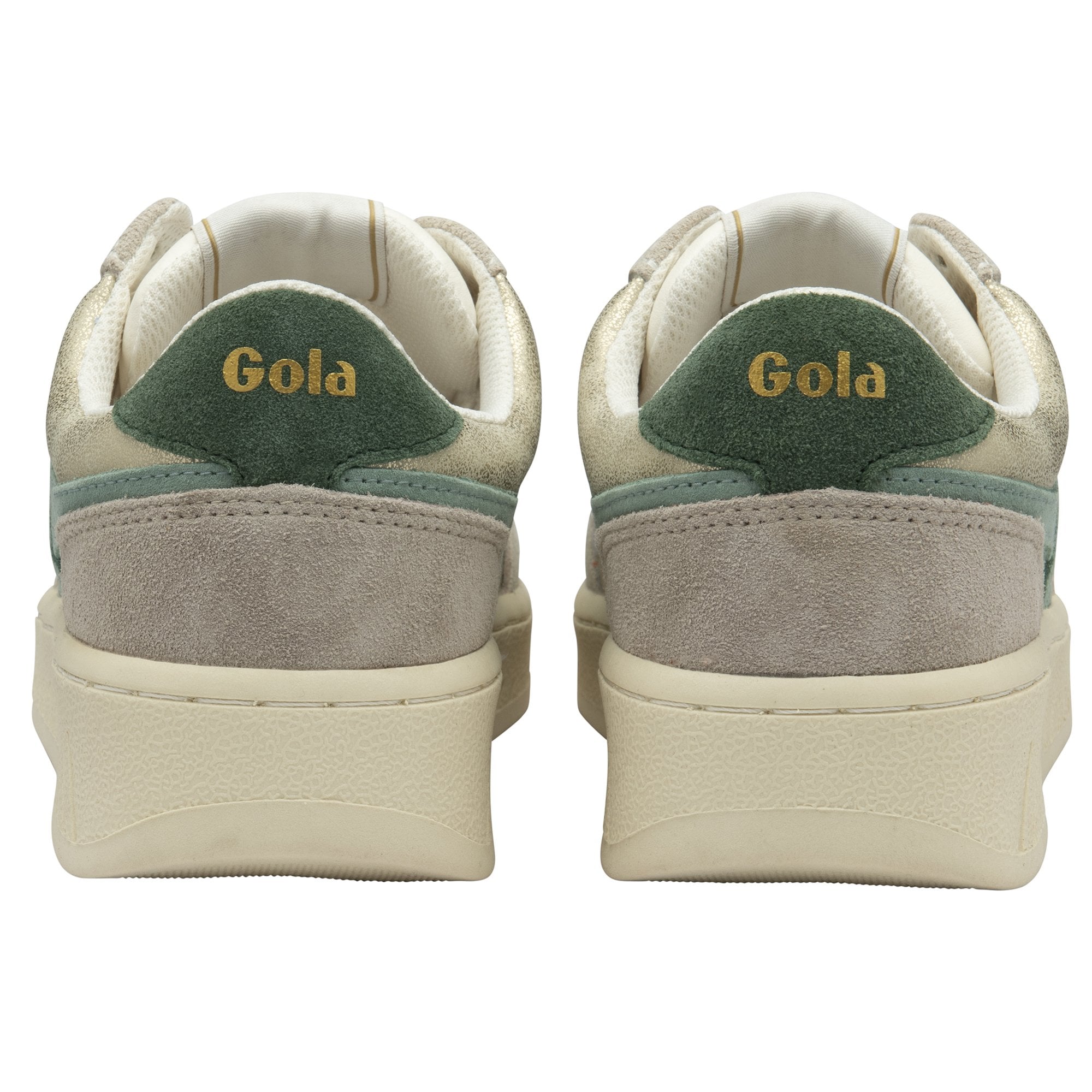 The back view of a pair of Gola women's low-top sneakers in white and green.