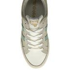 An overhead view of a Gola women's low-top sneaker in white and green.