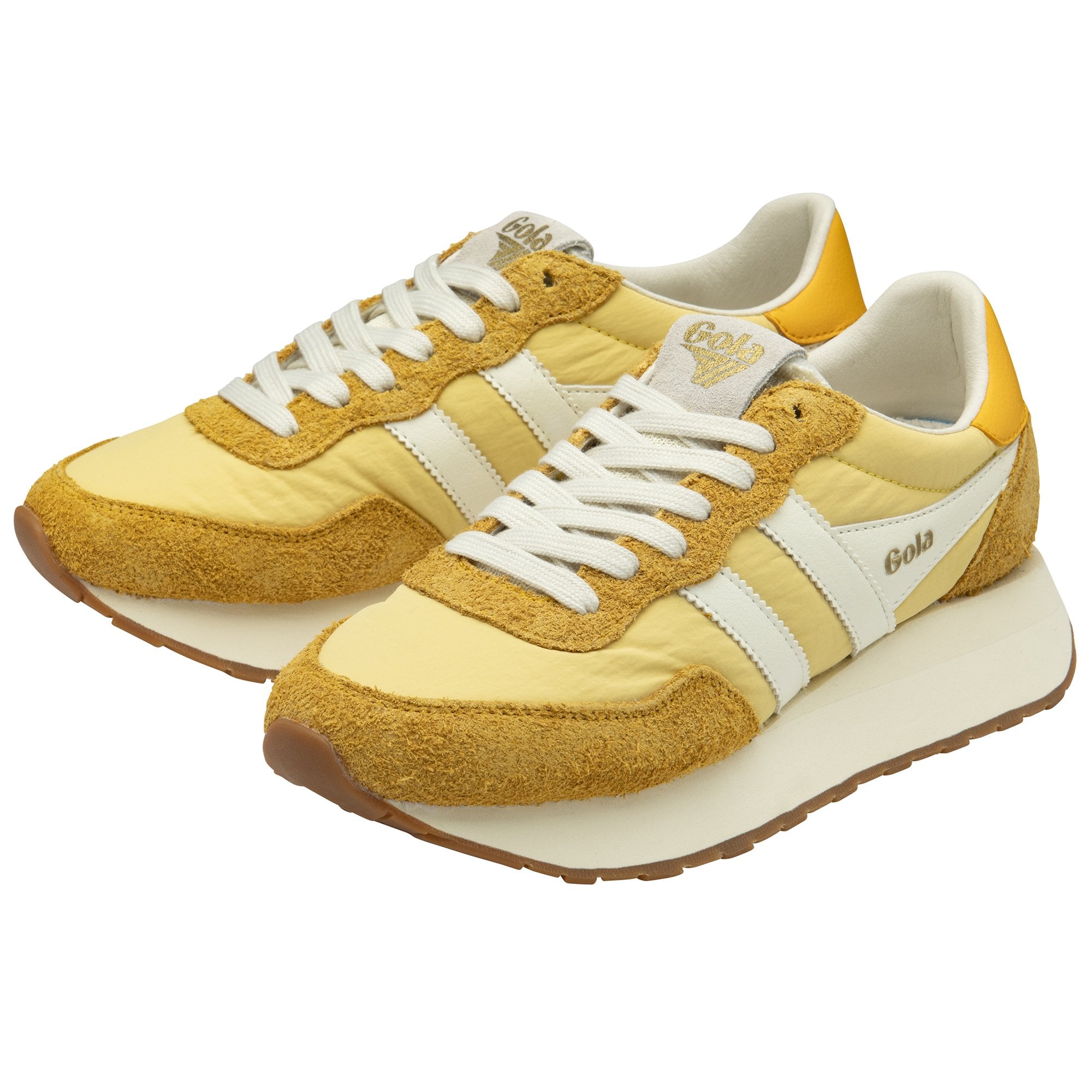 Two Gola shoes with thick white soles, white stripes, and mustard yellow accents.