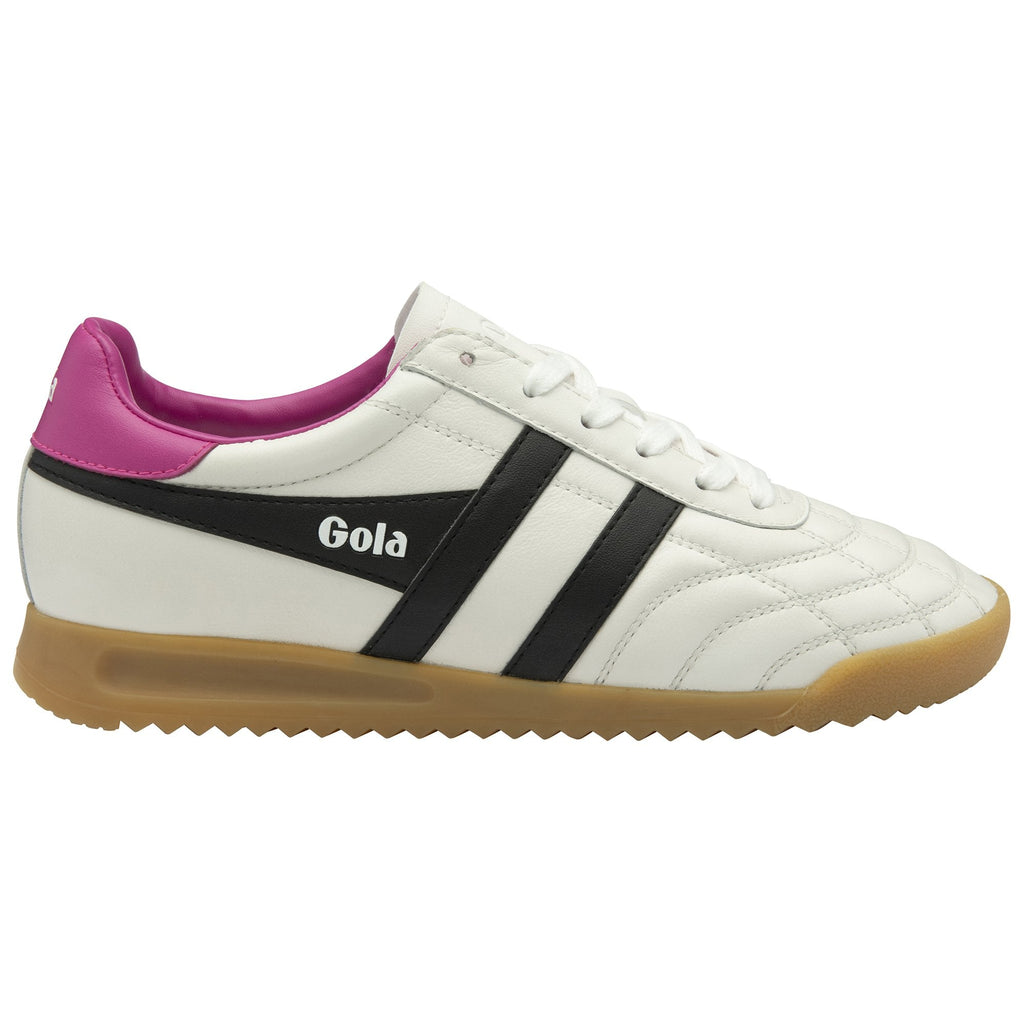 Side profile of a Gola men's indoor trainer with black stripes on a white base and a pink accent.