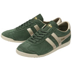 A pair of green Gola trainers with gold stripes and branding, shown from a side view.