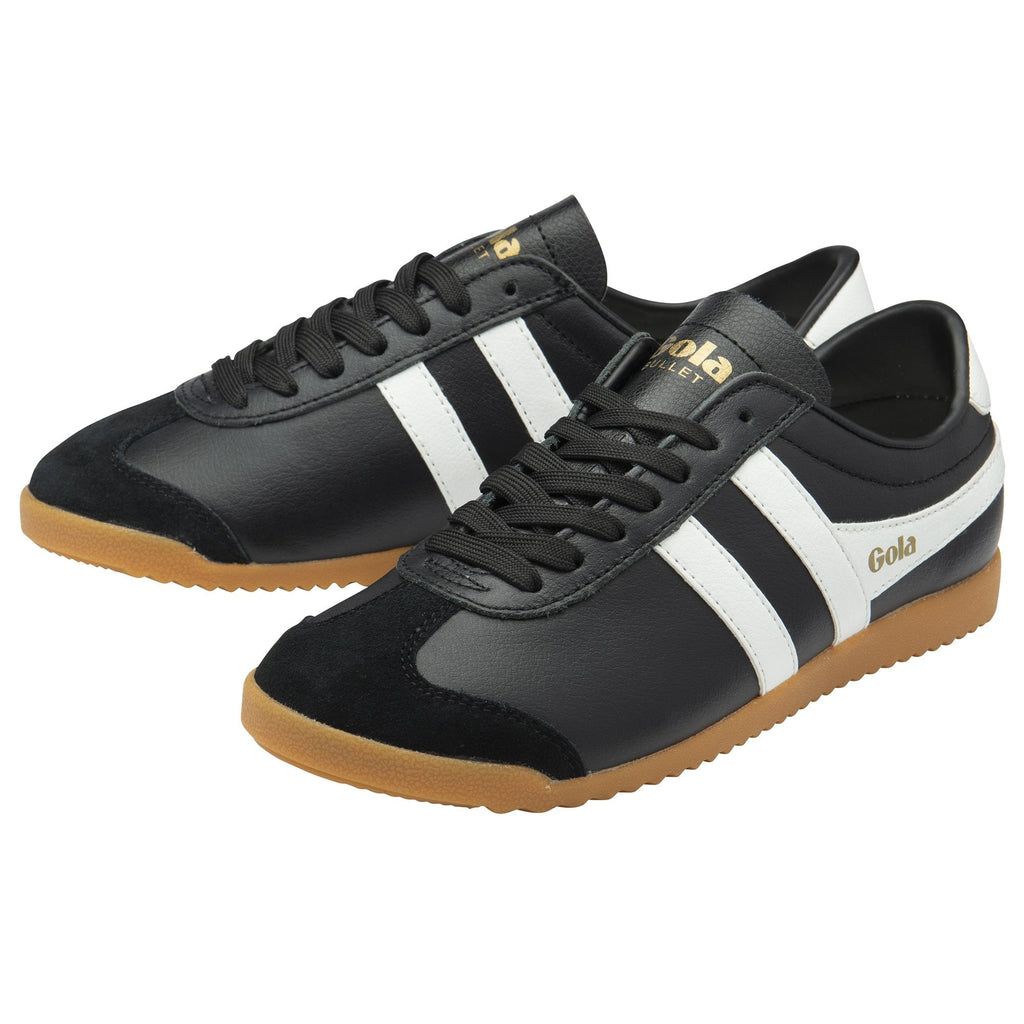 A pair of black Gola Bullet sneakers with white stripes, black suede toes, and gum soles.