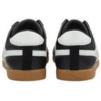 The rear view of two black Gola Bullet sneakers with white heel accents and gum soles.