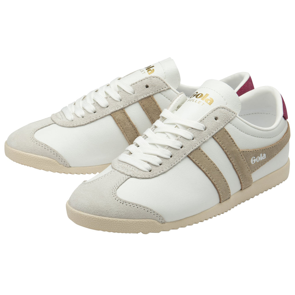 A pair of Gola Bullet trainers with white upper, beige stripes, and burgundy heel tabs.