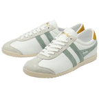 A pair of white and sage green Gola sneakers with mustard heel accents, positioned at an angle.