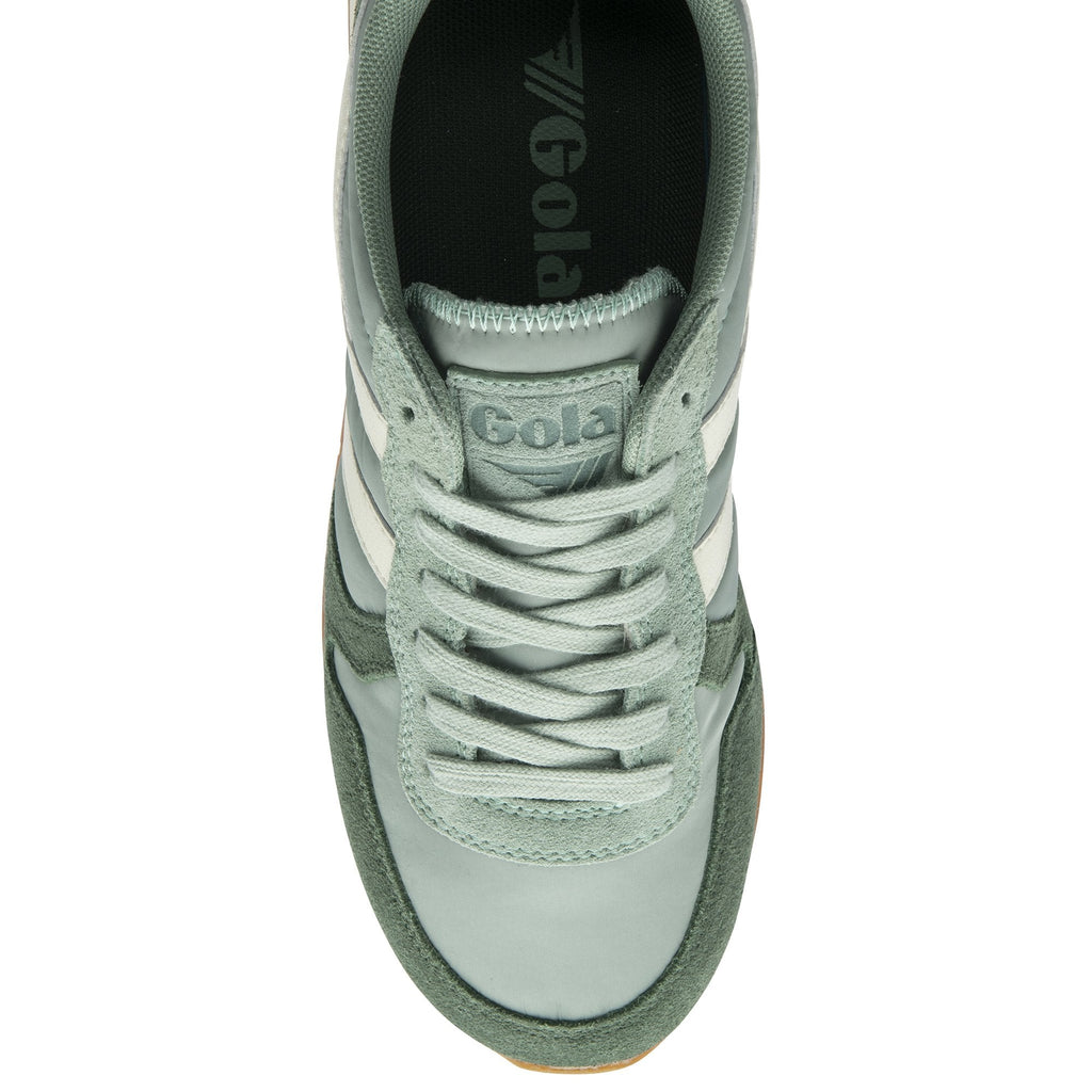 The top-down view of a green Gola sneaker is shown on a white background.