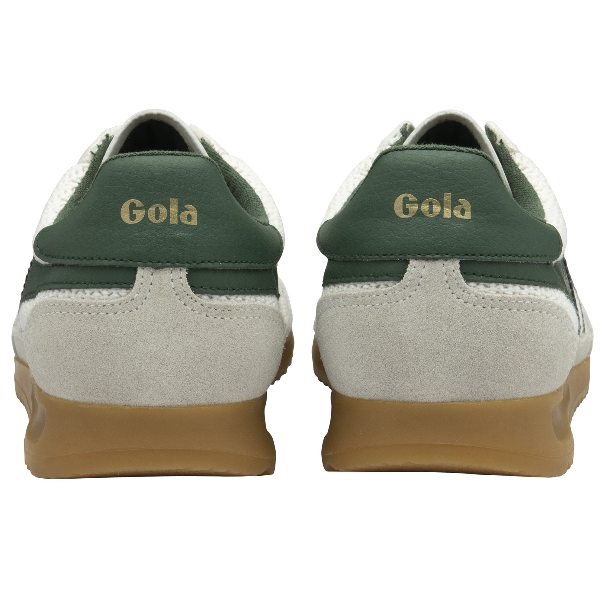 The backs of two white and green Gola sneakers, showing the green heel tab.