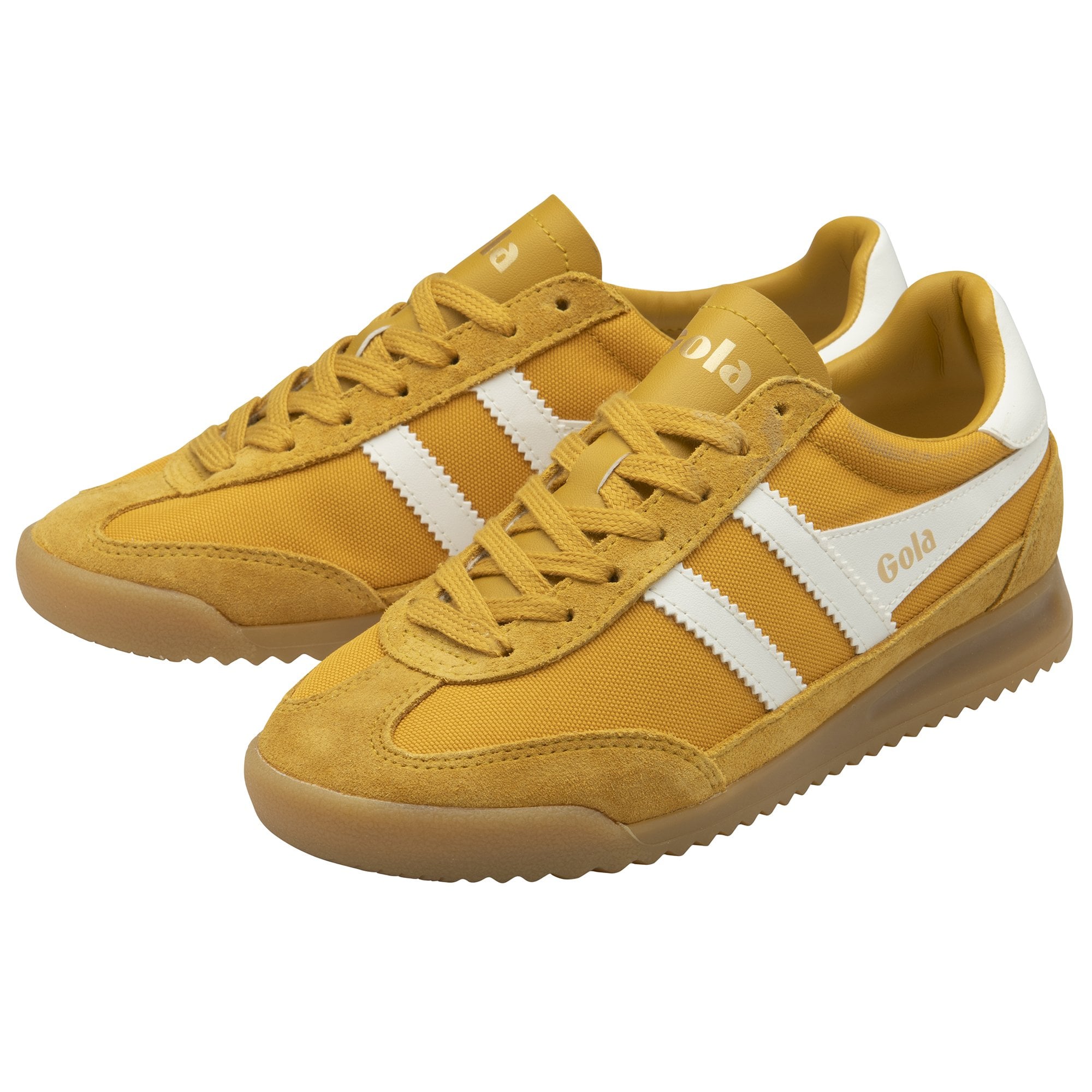 A pair of mustard yellow Gola trainers with white stripes and gum soles.