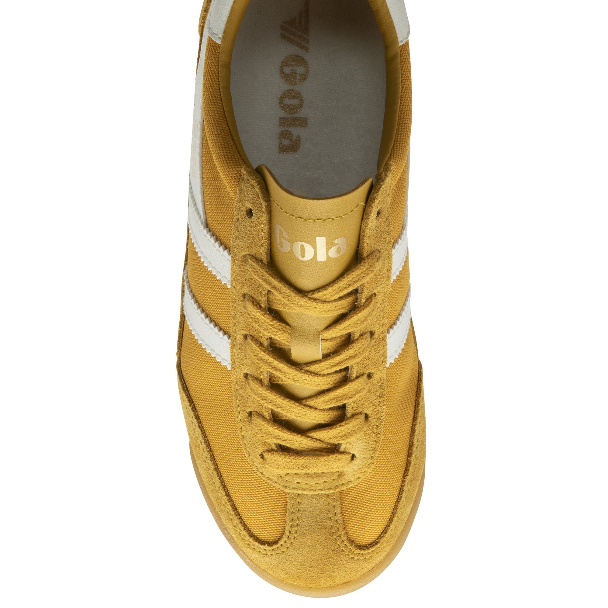 The top-down view of a single mustard yellow Gola trainer with white stripes.