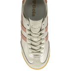 A top-down view of a shiny gold Gola sneaker with rose gold stripes and white laces.