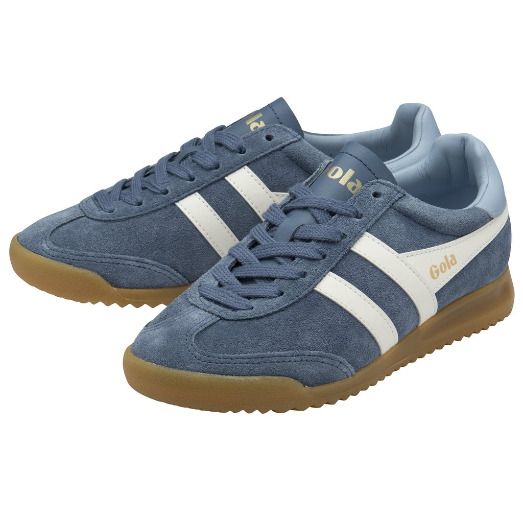 Pair of blue Gola trainers with white stripes and gum soles, angled for display.