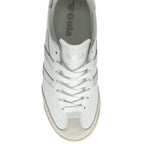 Top-down view of a white Gola sneaker with silver stripes and white laces.