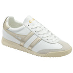 White and gold Gola sneaker, side view.