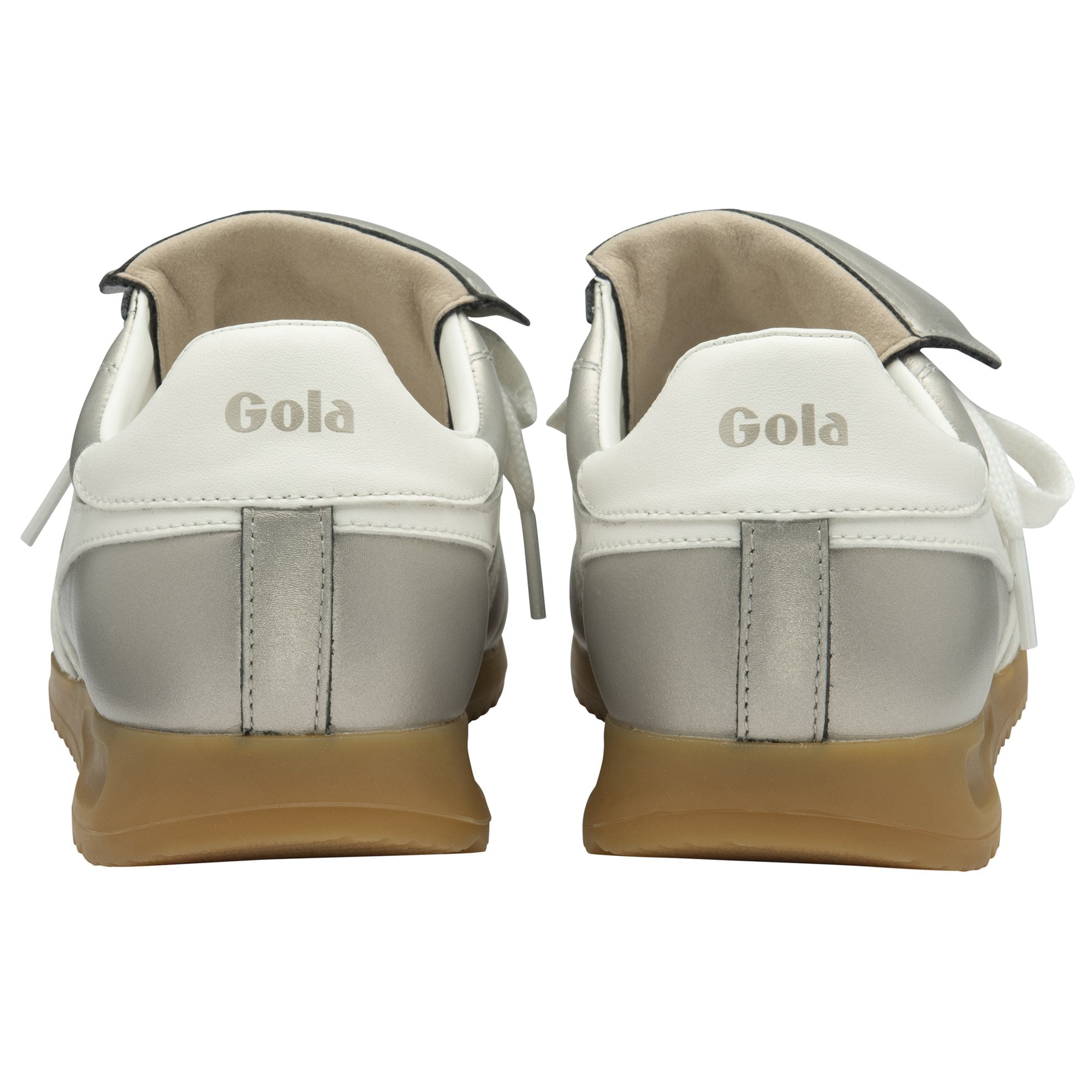 Rear view of silver Gola sneakers with white heel tabs and gum soles. 