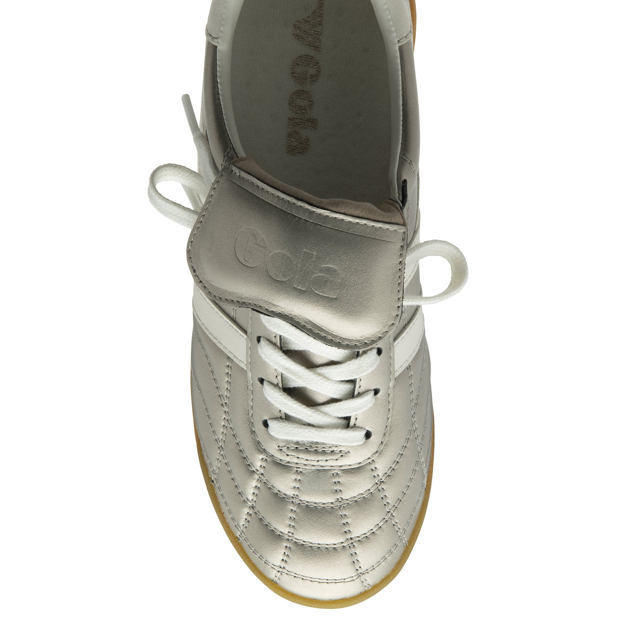 Top-down view of a silver Gola sneaker with white laces and a gum sole. 