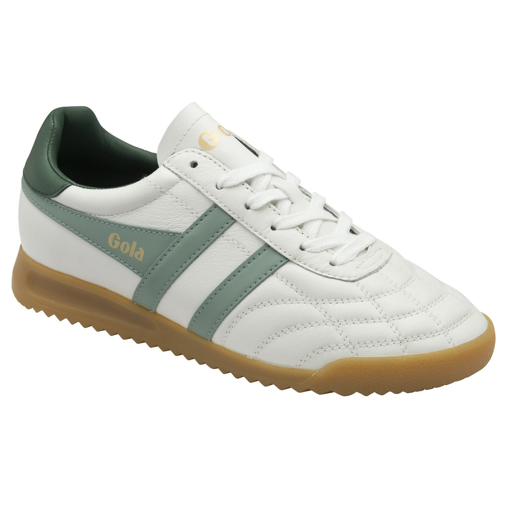 Angled view of a Gola white and green sneaker with a brown sole.