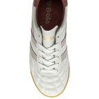 The top-down view of a white Gola women's sneaker with pink stripes and white laces.