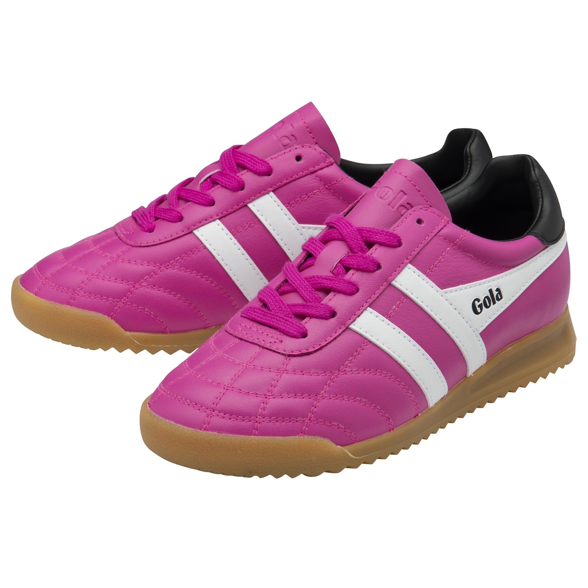 A pair of Gola trainers in bright pink with white stripes and black heel detailing.