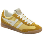 Angled view of a single Gola men's Trainer in light yellow and mustard with white stripes.