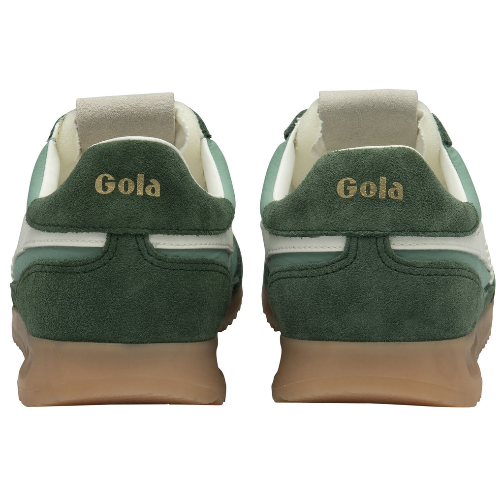 A pair of Gola Hurricane trainers in green and white, viewed from the rear.