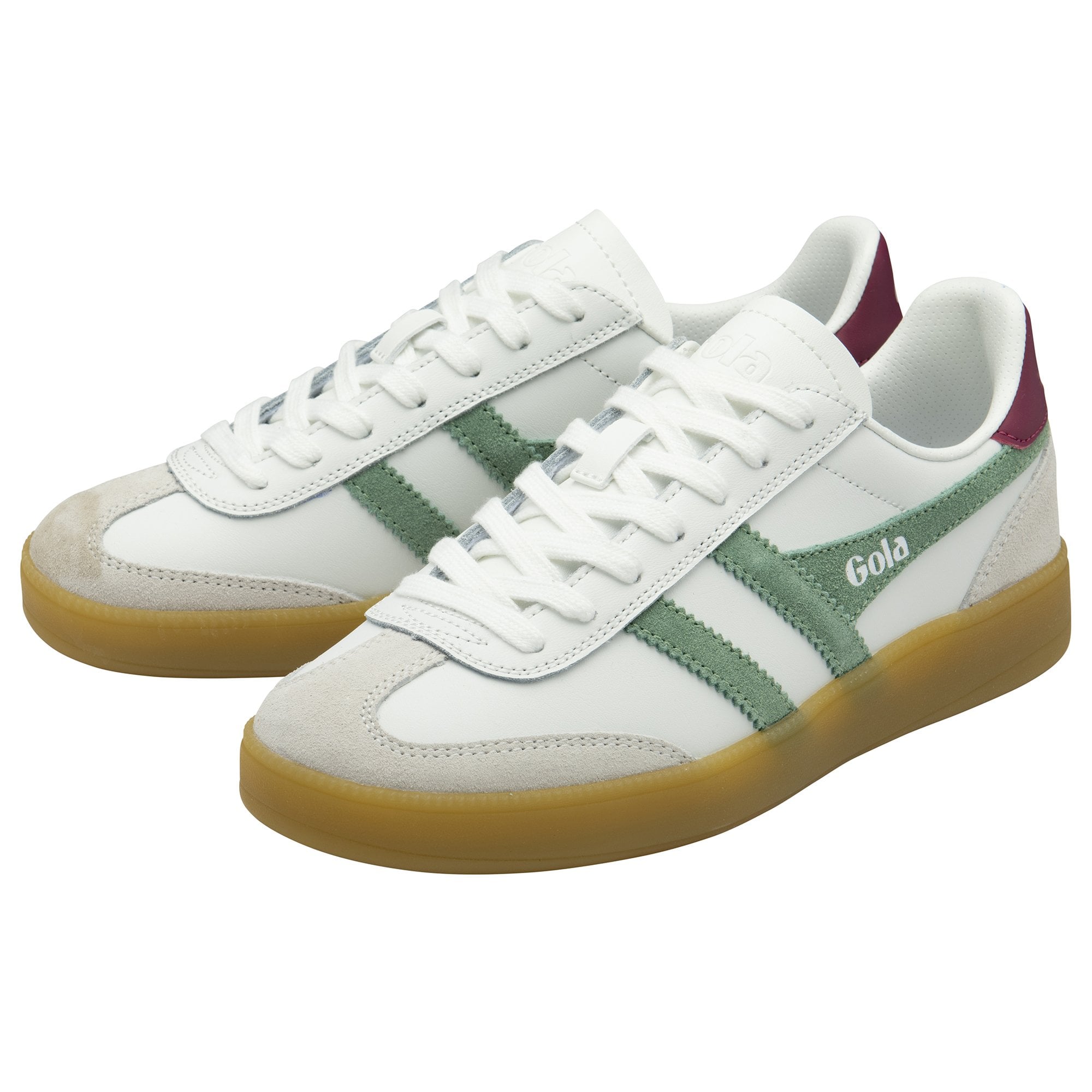 Pair of white and green Gola sneakers with gum soles, viewed at an angle.