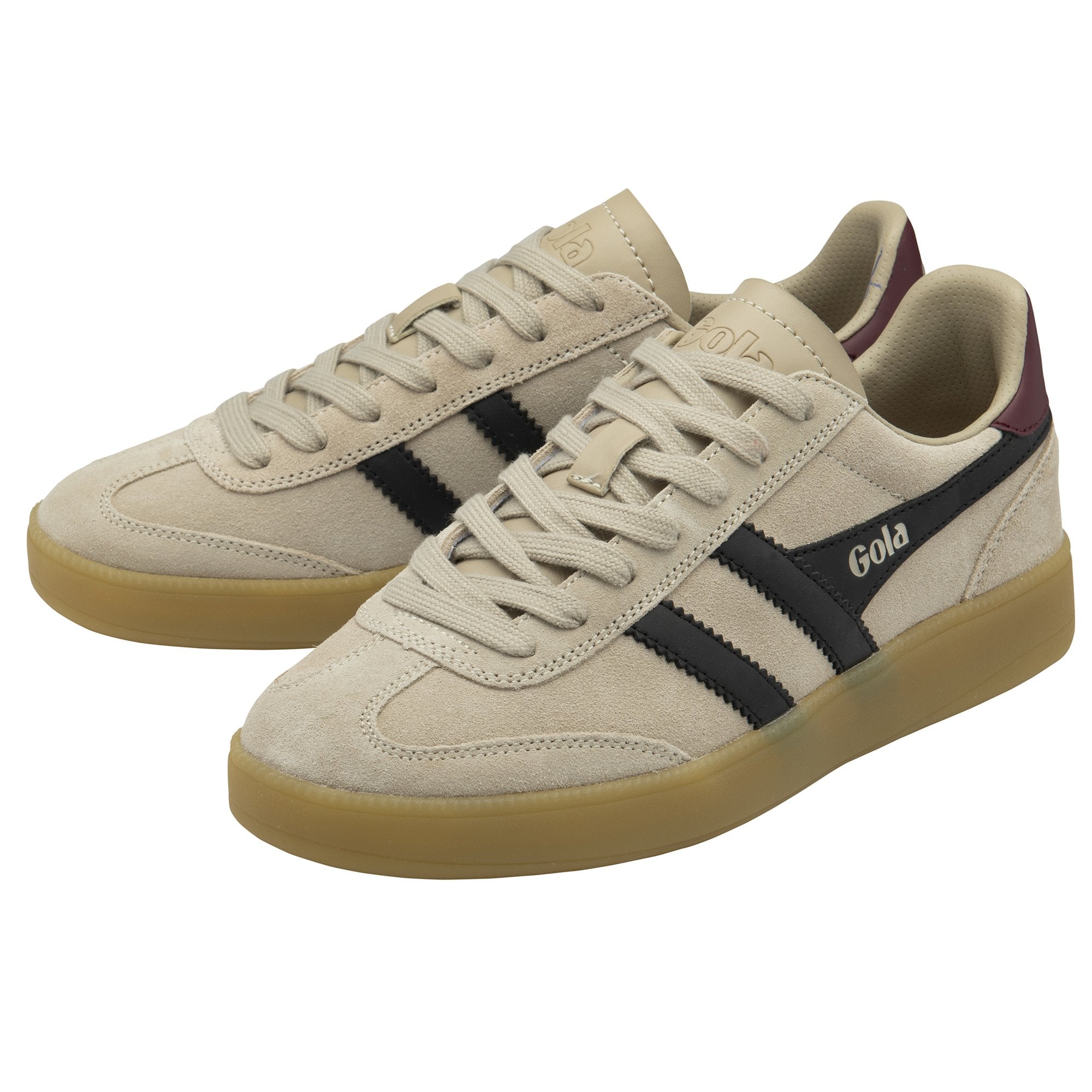 Pair of beige Gola sneakers with black stripes and maroon heel accents.