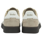 The back view of two beige Gola sneakers, highlighting the white heel tab with logo.