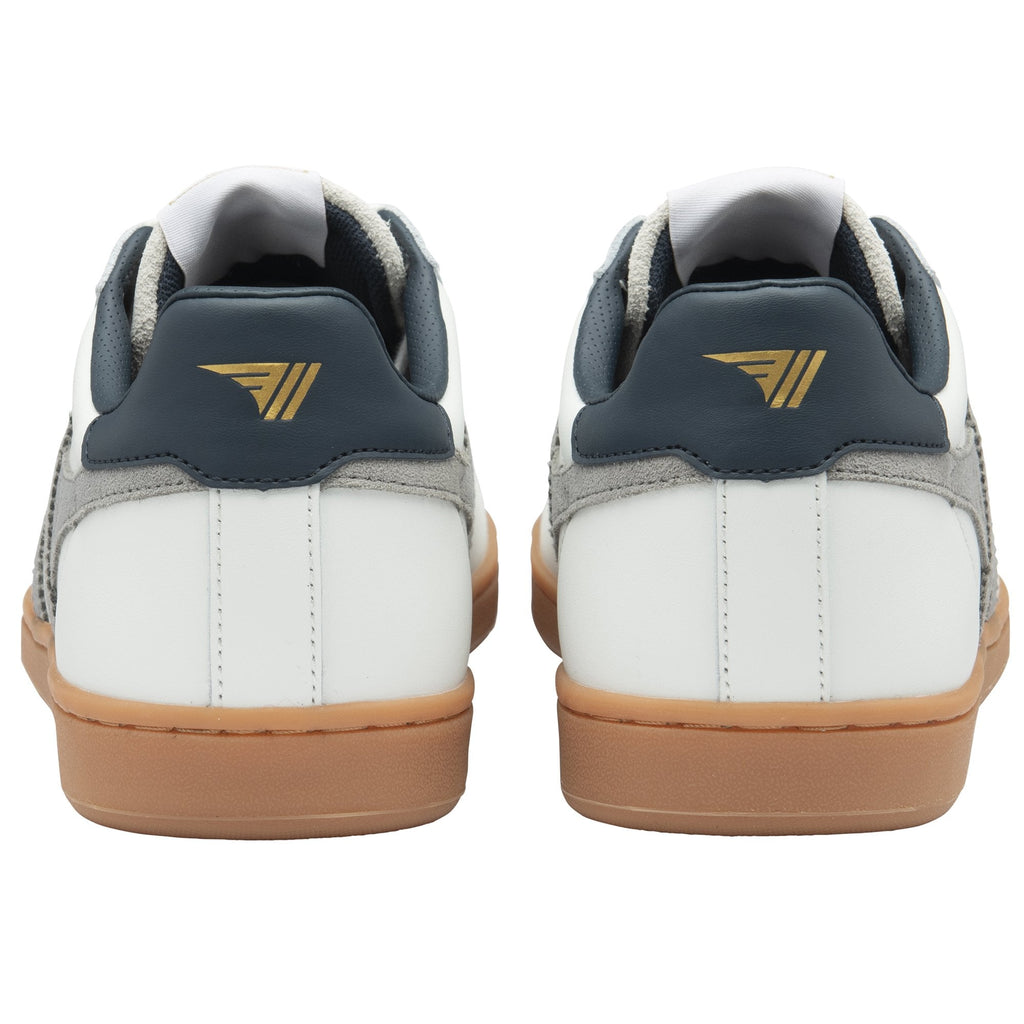 The rear view of two white Gola sneakers with navy heel tabs and gold logos.