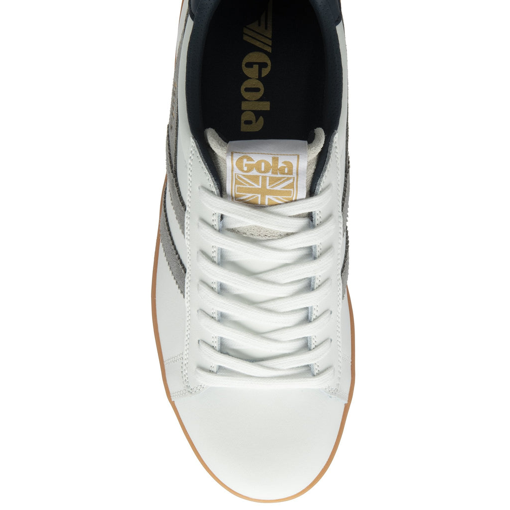 A top-down view of a white Gola sneaker with white laces and a gold tongue logo.