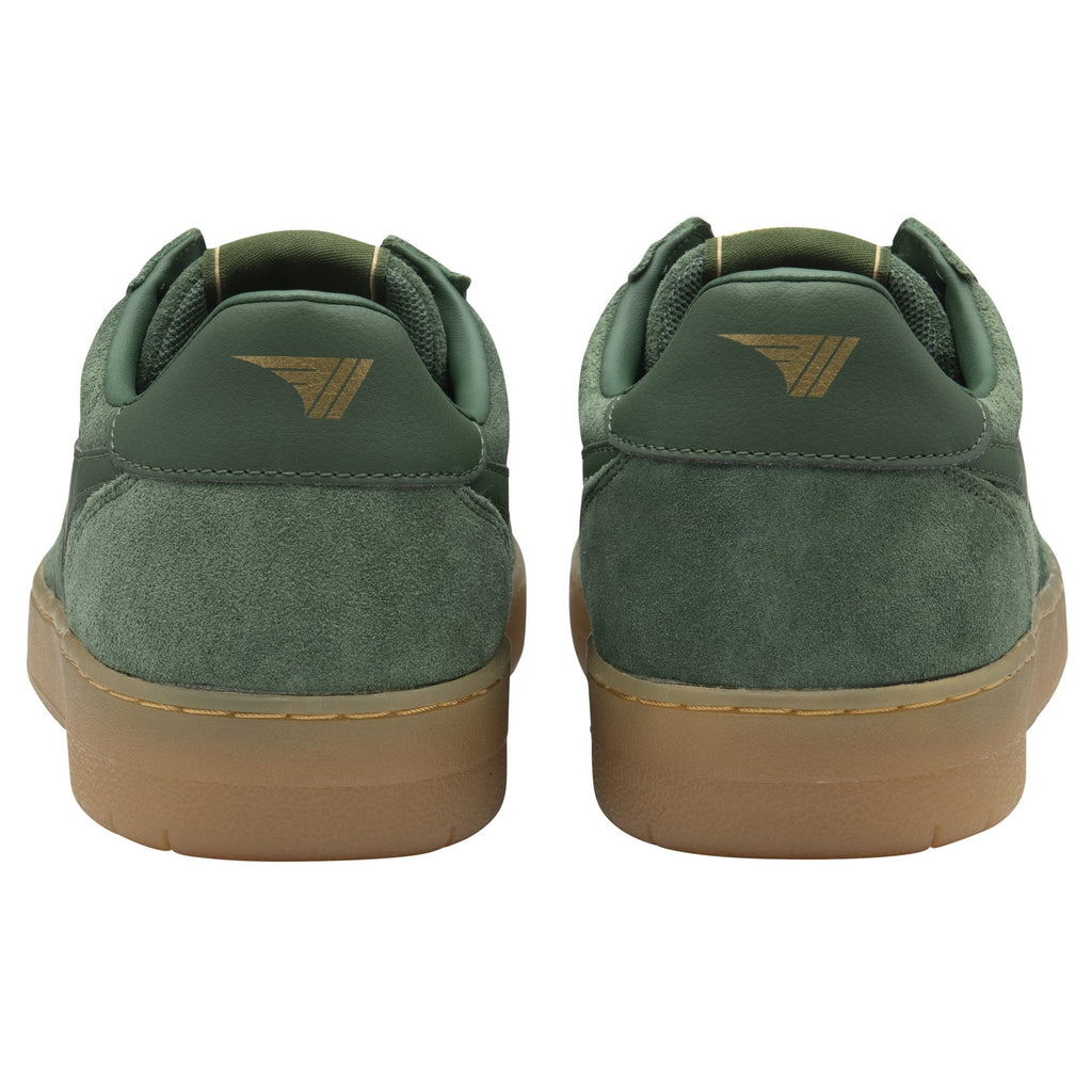 The back view of a pair of dark green Gola sneakers with brown soles.