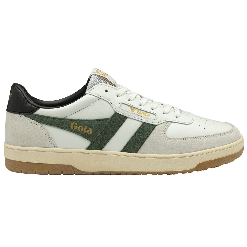 A white Gola sneaker with green stripes, black heel, and tan sole from a side view.
