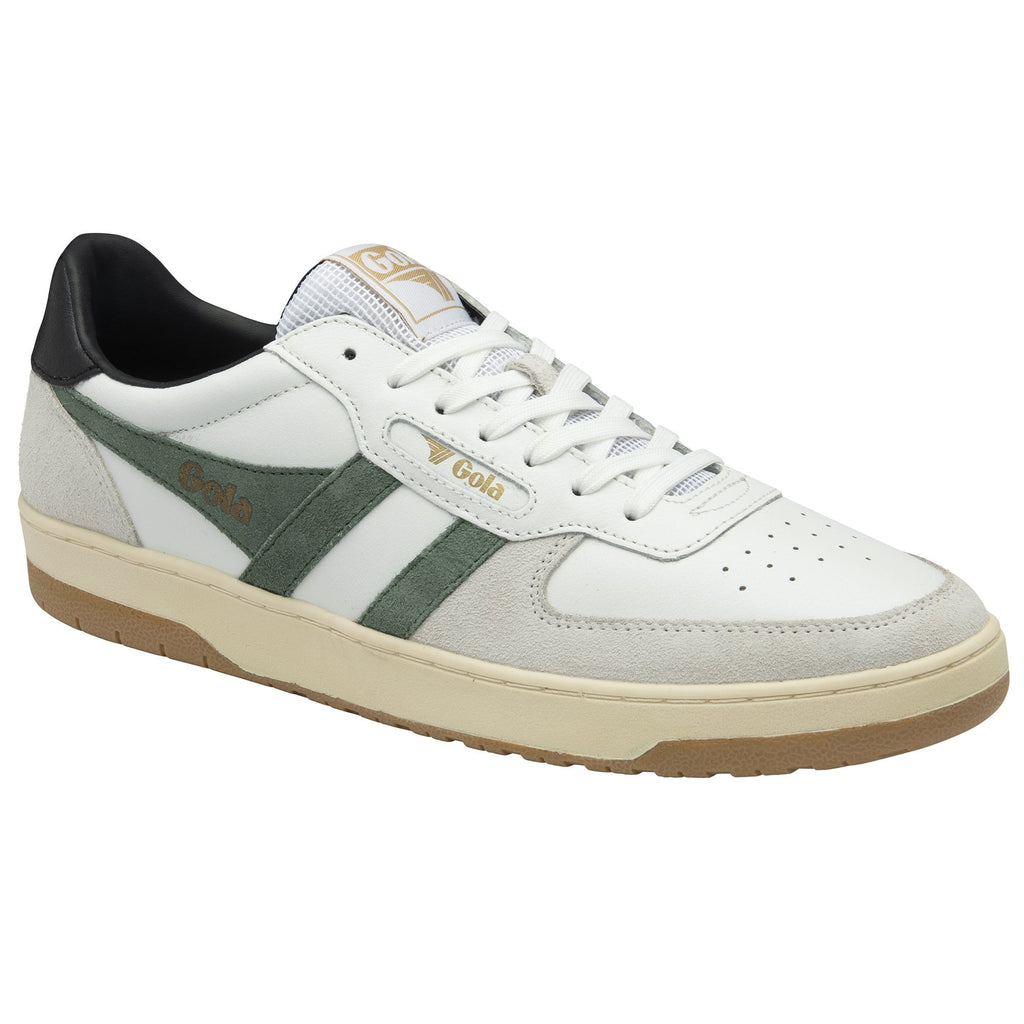 A white Gola sneaker with green stripes, black heel, and tan sole from an angled view.