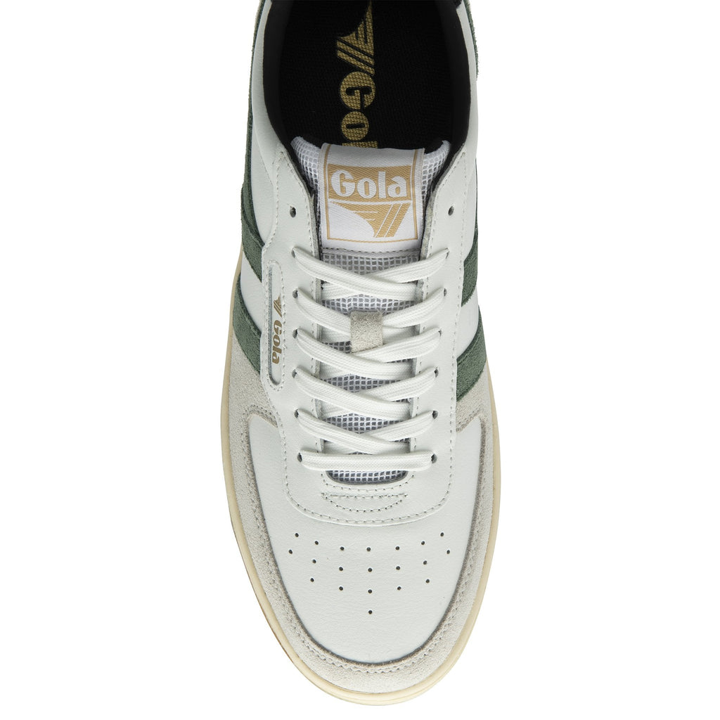 The top-down view of a white Gola sneaker with green stripes and tan sole.