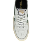 The top-down view of a white Gola sneaker with green stripes and tan sole.